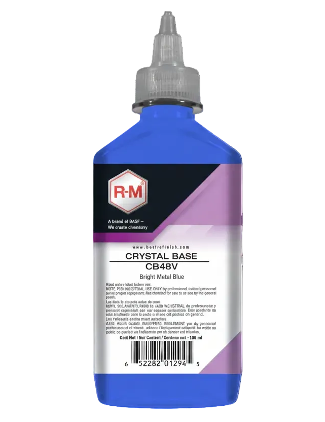 Bottle of R&M Crystal Base paint with blue and purple label on a white background