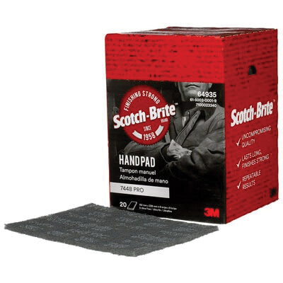 Scotch-Brite handpad with packaging on a white background
