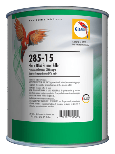 Can of Glasurit 285-15 Black DTM Primer Filler with label on a green background
